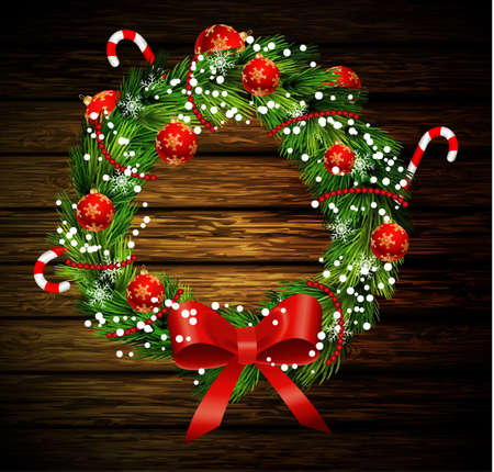 White card with Christmas wreath and bow and bells isolated on rustic wooden backgroundのイラスト素材