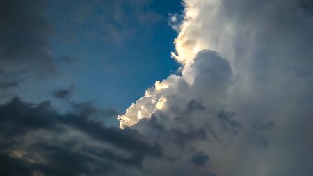 beautiful sky with the clouds of different coloursの写真素材