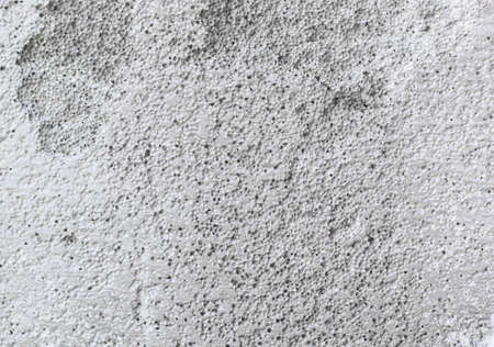 Black white porous concrete surface. Grunge texture for design and background. Copy space concept.の写真素材