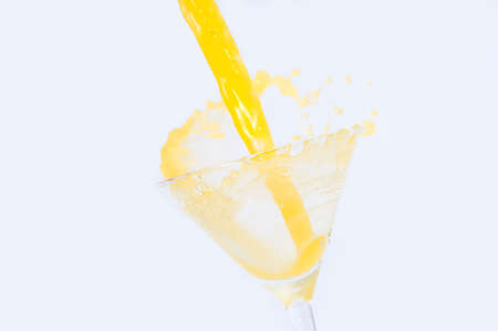 spalshing drink isolated on whiteの写真素材