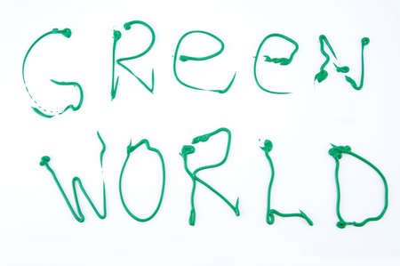 green paint inscription on whiteの写真素材