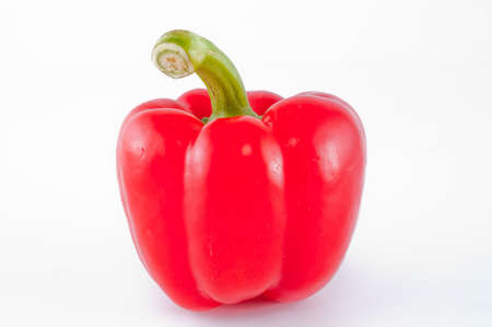red fresh pepper isolated on whiteの写真素材