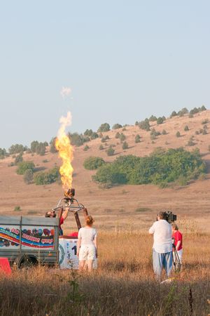 SEVASTOPOL, UKRAINE - 12 August: Check the fuel system before starting, International Balloon Festival Montgolfeerie, August 12, 2010 in Sevastopol, Ukraine.のeditorial素材