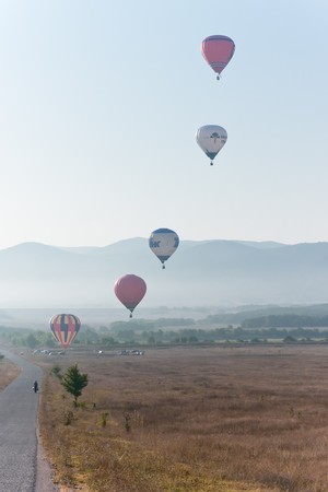SEVASTOPOL, UKRAINE - 12 August: Baloons flying air over the territory starting in the valley Baydarskaya, International Balloon Festival Montgolfeerie, August 12, 2010 in Sevastopol, Ukraine.のeditorial素材