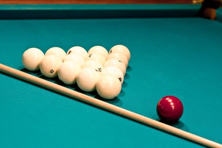 arrangement of balls and a cue to play Russian billiardsの写真素材