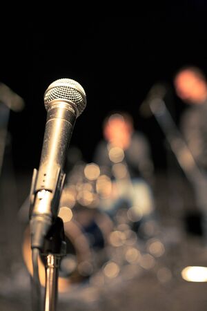 SEVASTOPOL, UKRAINE - 27 April: microphone soloist on the background of a drummer, April 27, 2011 in Sevastopol, Ukraine.のeditorial素材