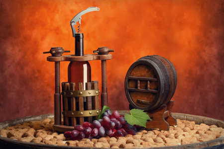 winepress with a bottle and keg in still lifeの写真素材