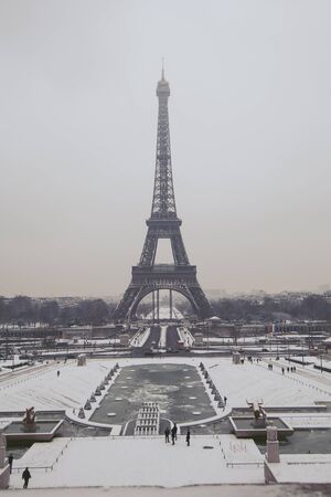 The Eiffel Tower in the snow and fogの写真素材