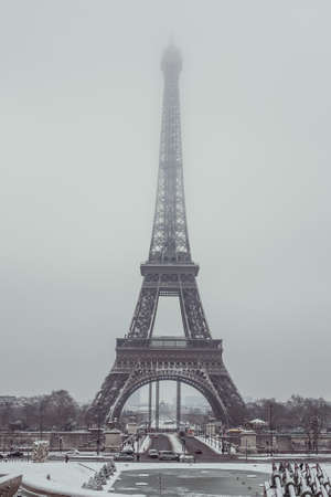 The Eiffel Tower in the snow and fogの写真素材