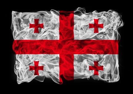 The flag of Georgia consists of a smokeの写真素材