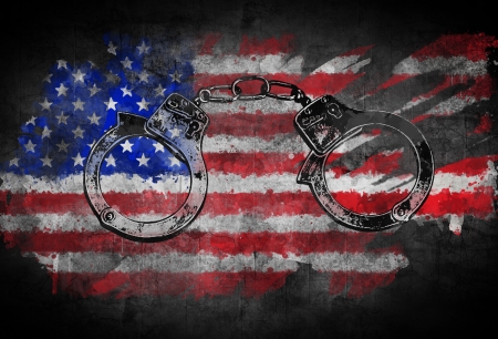 Poster with handcuffs on an American flag backgroundの写真素材