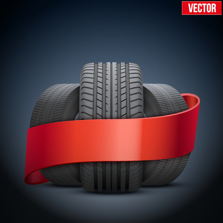 Realistic wheels and tire symbol with ribbon. Front view. Vector Illustration isolated on white background.のイラスト素材