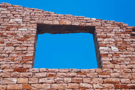 window to the sky in old brick wall