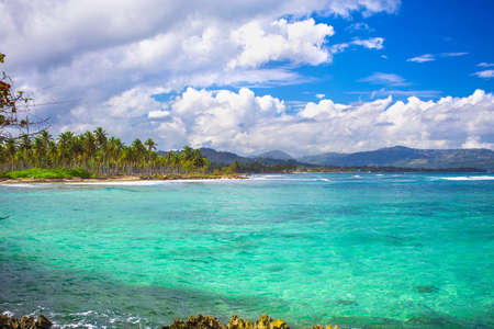 Caribbean sea surface summer wave background. Exotic water landscape with clouds on horizon. Dominican Republic nature relax. Travel tropical island resort. Ocean nature tranquilityの写真素材