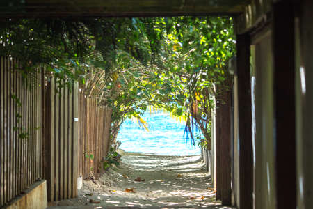 the tunnel leading to the azure seaの写真素材