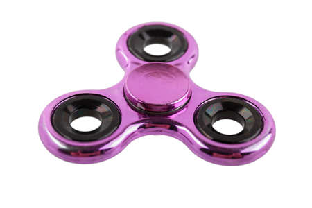 purple metal spinner isolated on white background. popular fashionable trendy toy of 2017の写真素材