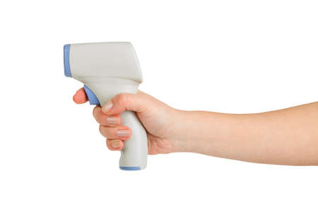 temperature measurement by wireless thermometer, female hand holding infrared thermometer on white backgroundの写真素材