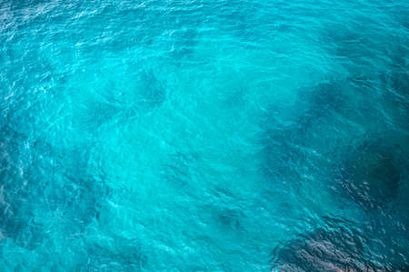 bright light blue sea texture, Sea surface, texture of water, background or texture, ocean, blue waterの写真素材