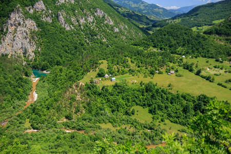 Montenegro's green mountains and lake, beautiful mountain landscapeの写真素材