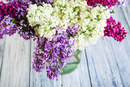 Purple and white lilac flowers as a background