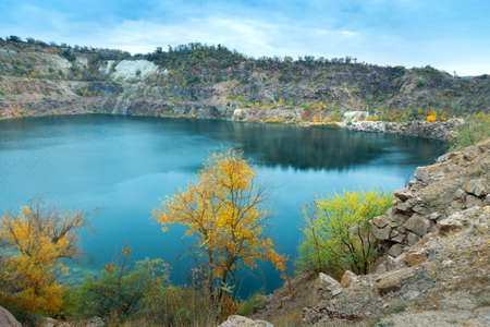 great radon blue lake, granite quarry in autumnの写真素材