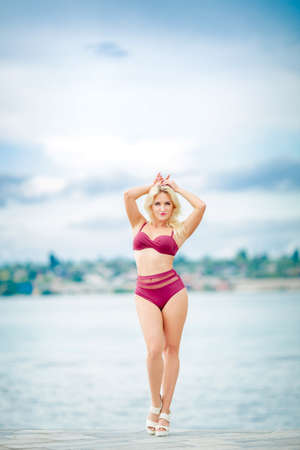 Female model in bikini on nature backgroundの写真素材