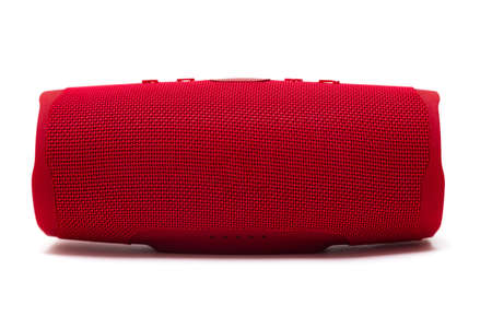Portable red speaker isolated on white background.の写真素材
