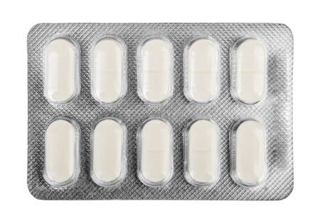 white pharmaceutical medication pills in blister packの写真素材