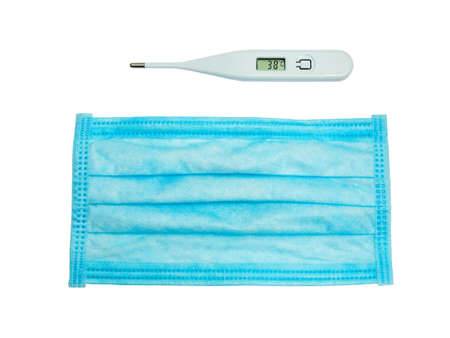 White thermometer and blue medical mask isolated on white background. Protection against pollution...