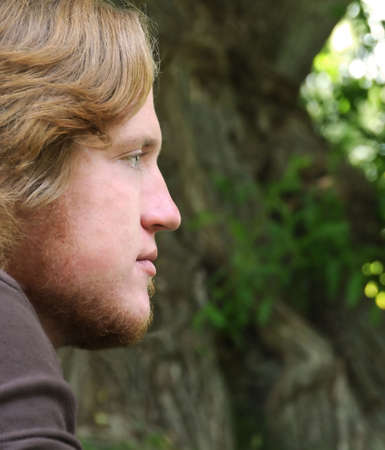 Man staring off into the distanceの写真素材