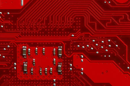 A motherboard close up showing some circuitsの写真素材