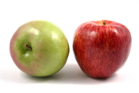 Red and green apple over a white background.の写真素材