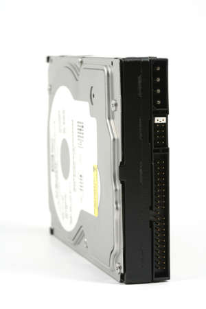 Internal hard disk drive view, vertical format, on a white background.の写真素材
