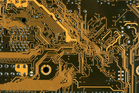 Computer pathways on a board, gold toned.の写真素材