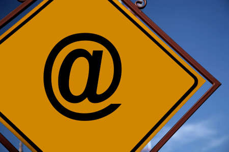 E-mail yellow romboid road sign with an ornamental frame of bronze color.の写真素材