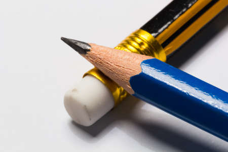 pencil and eraser at the end of the pencil, on white backgroundの写真素材