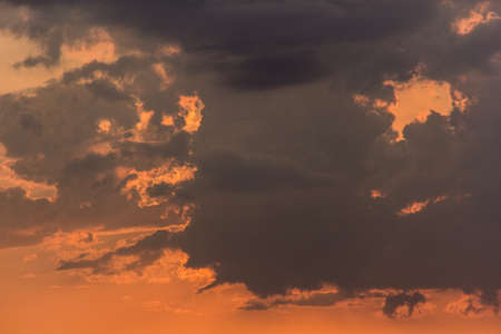 Photo of the sky at sunset, with cloudsの写真素材