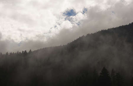 Photos of mountains with mist, in the Val d'Aostaの写真素材