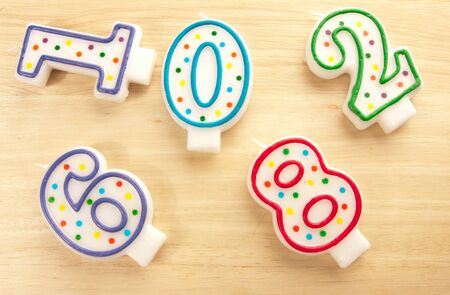 A lot of candles on the tableの写真素材