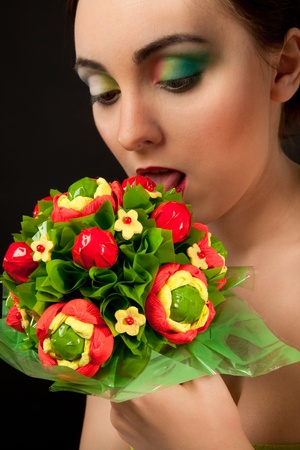 Picture of sexy woman with candy bouquetの写真素材