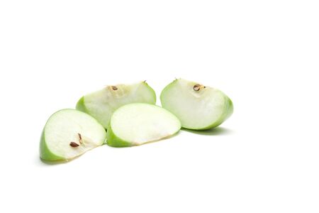Sliced green apple isolated on whiteの写真素材