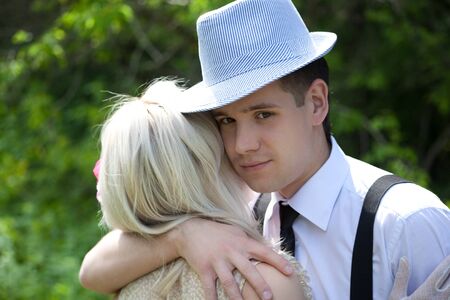 Picture of beautiful couple hugging outdoorsの写真素材