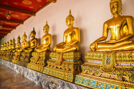 Golden Buddha image in thailandの写真素材