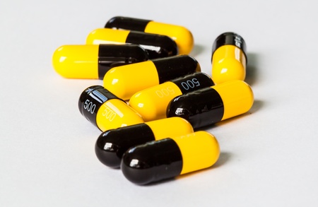 Colorful pill filled with text, message of healthyの写真素材