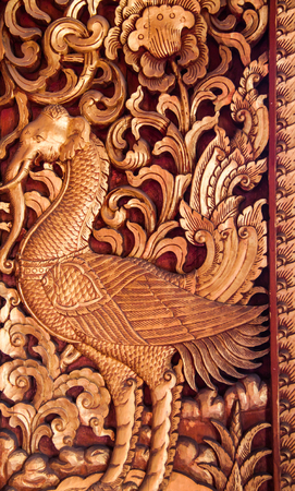 Wooden doors carved into lotus, decorated with stained glass, Thai Art.のeditorial素材