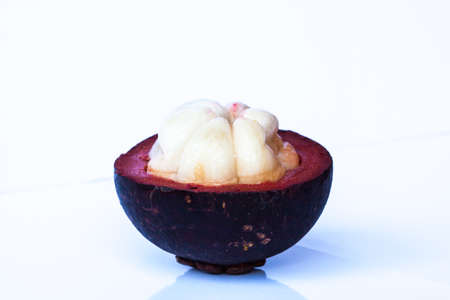 tropical mangosteen fruit on white backgroundの写真素材
