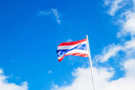 Thailand flag and blue skyの写真素材