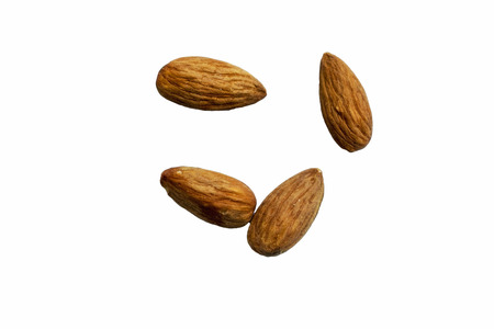 almonds isolated on white backgroundの写真素材