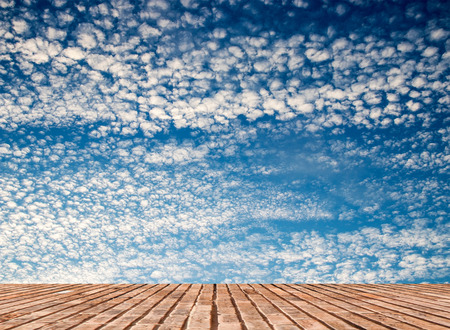 brick wall texture with blue sky backgroundの写真素材