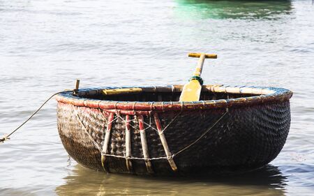 Mui Ne, Vietnam - Feb 23, 2017. Fishing boats docking on the sea in Binh Thuan, Vietnam. Binh Thuan Province is known for its beaches and coastal roads.のeditorial素材